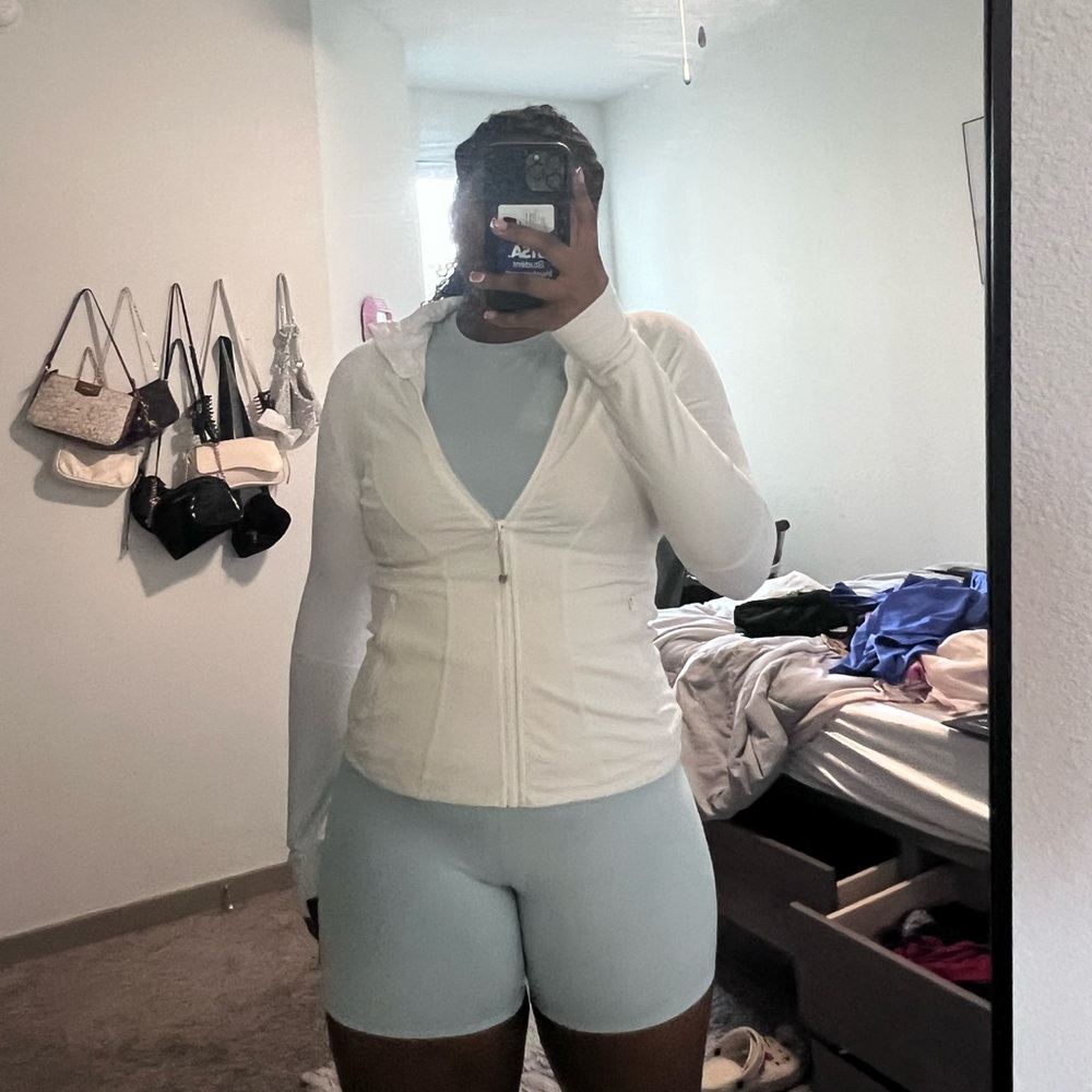 white athletic zip up jacket